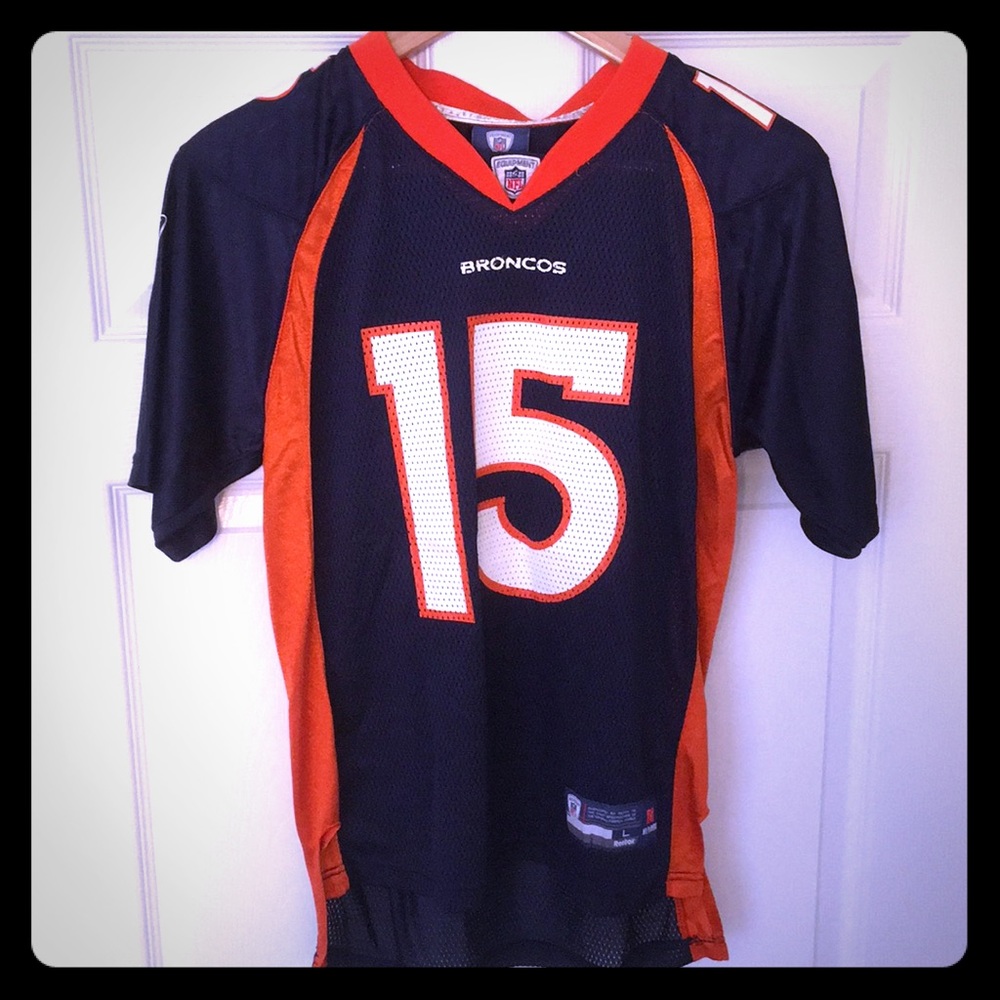 Tebow Jersey. Size YL. Never worn.
